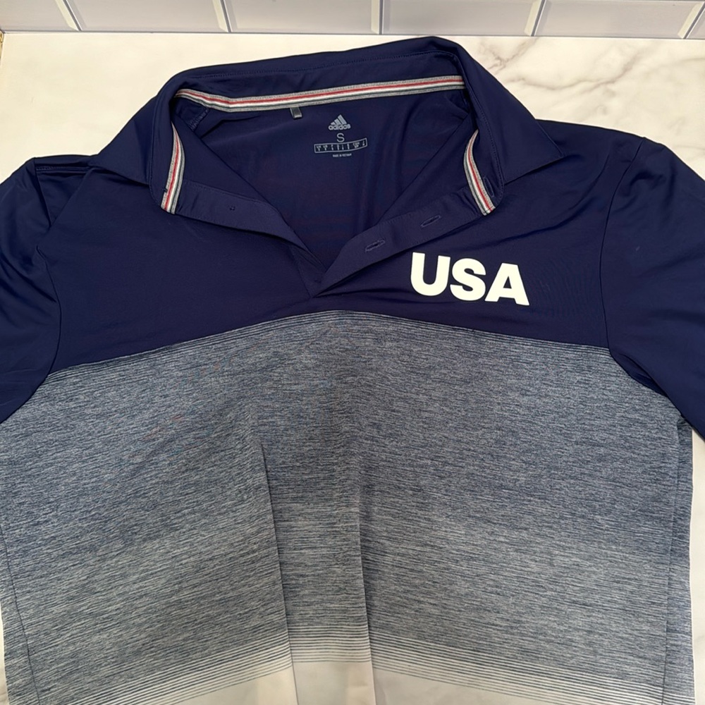 Adidas official Team USA Golf polo. Navy and white. Size small. Great condition.